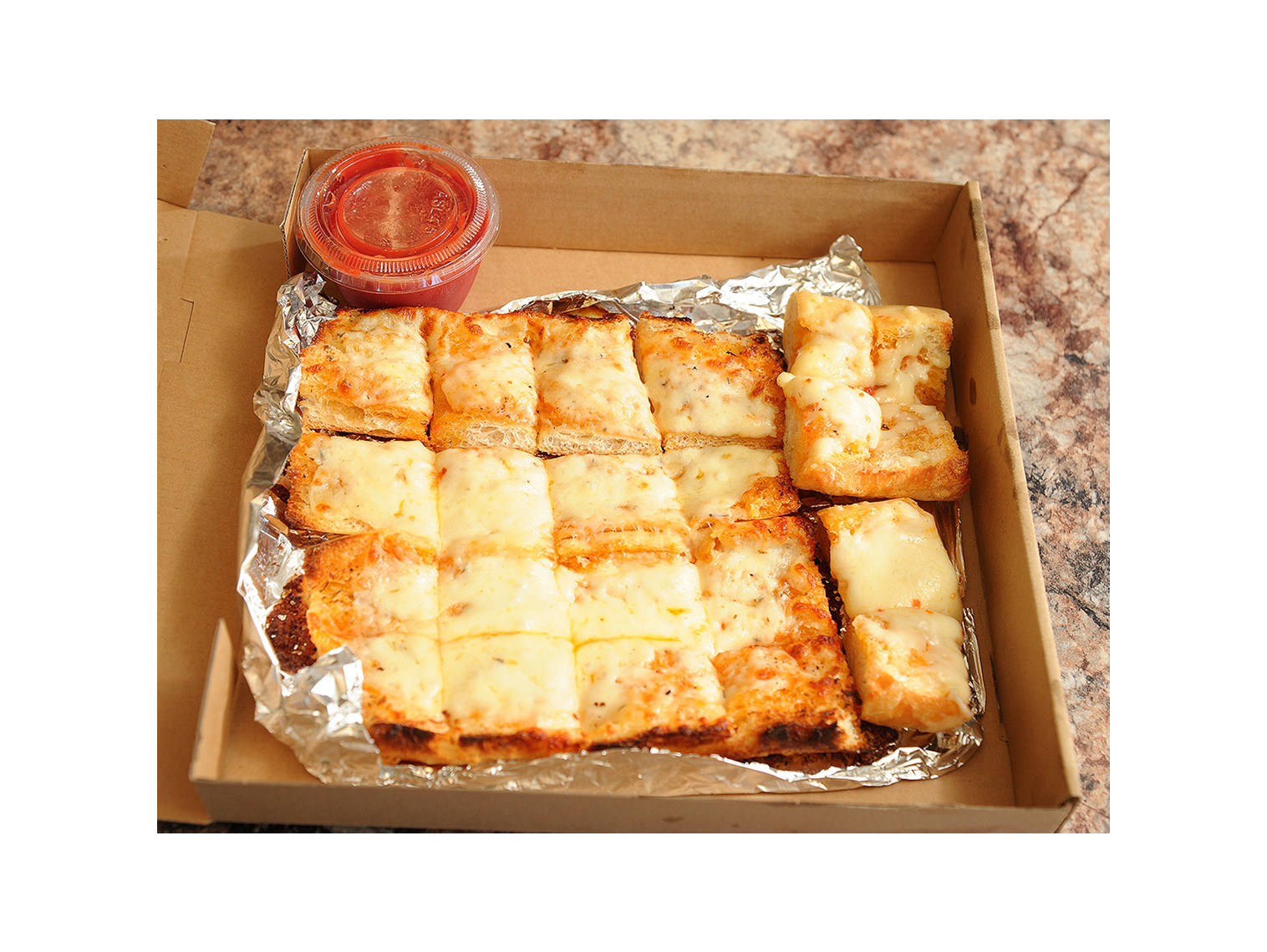 Order Garlic Bread with Mozzarella and Dipping Sauce food online from All Star Pizza store, Rochester on bringmethat.com