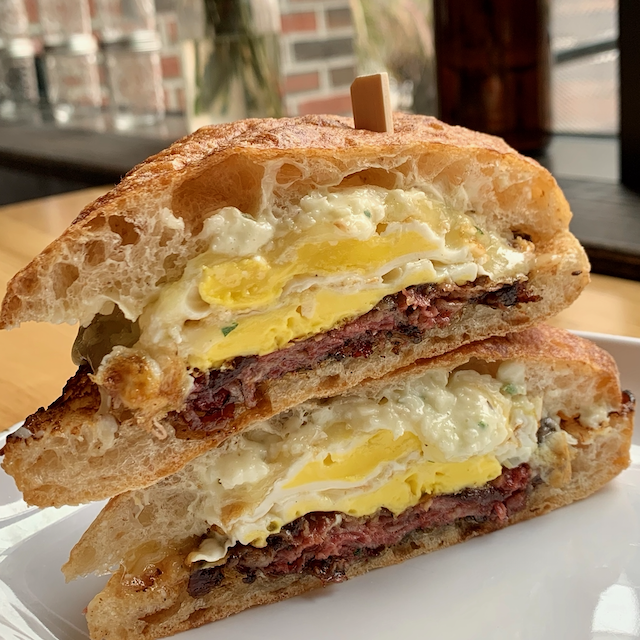 Order Grand Pastrami Egg & Cheese Sandwich food online from Good Company Doughnuts & Cafe store, Arlington on bringmethat.com