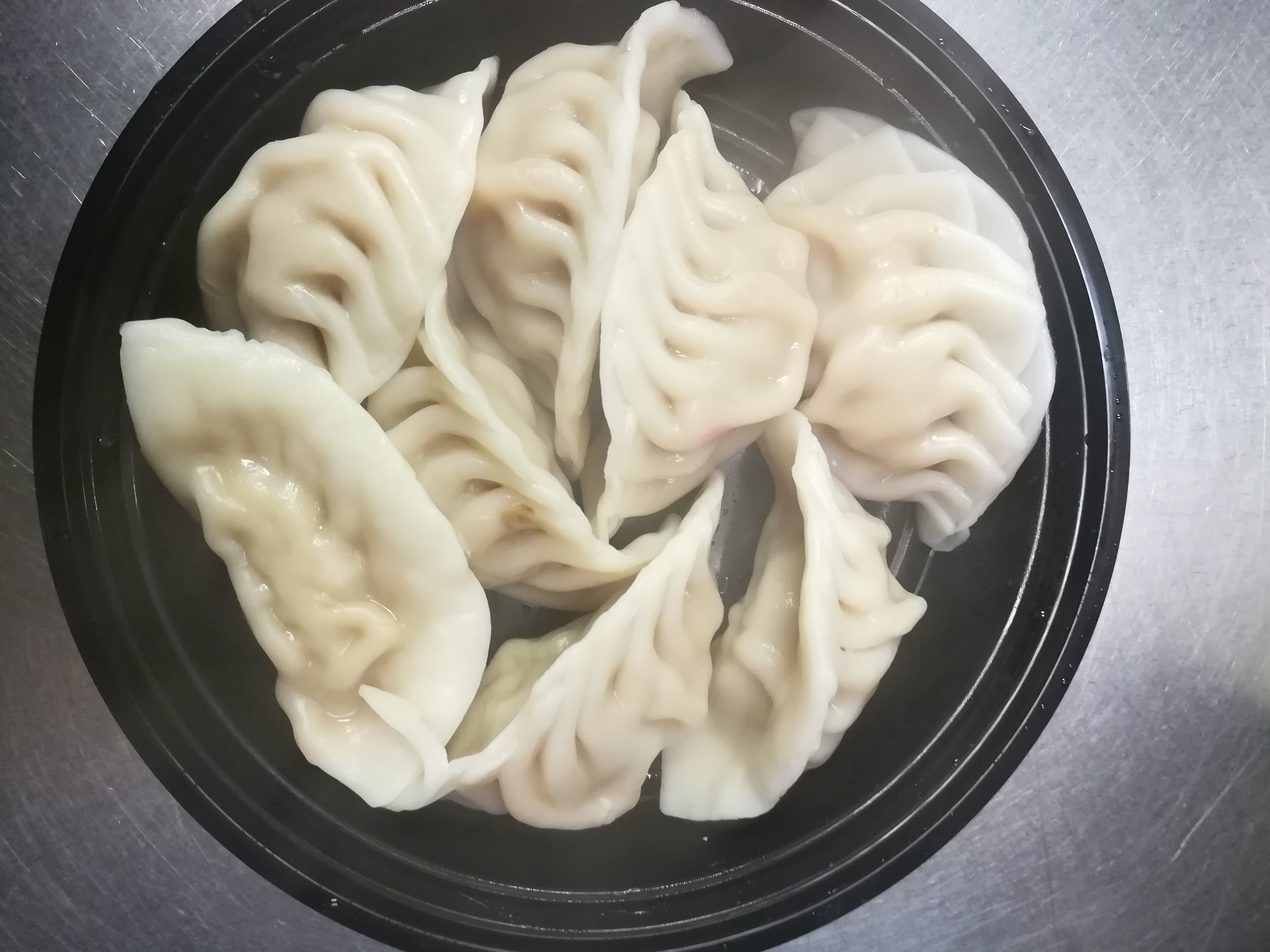 Order Home Made Dumpling (8) food online from Canton Wok store, Pawtucket on bringmethat.com
