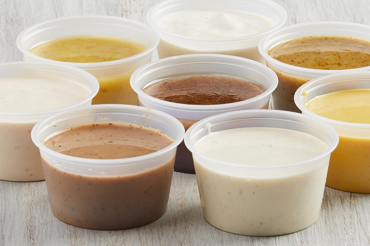 Order 4oz Extra Dressing food online from Newk's Eatery - Columbus store, Columbus on bringmethat.com
