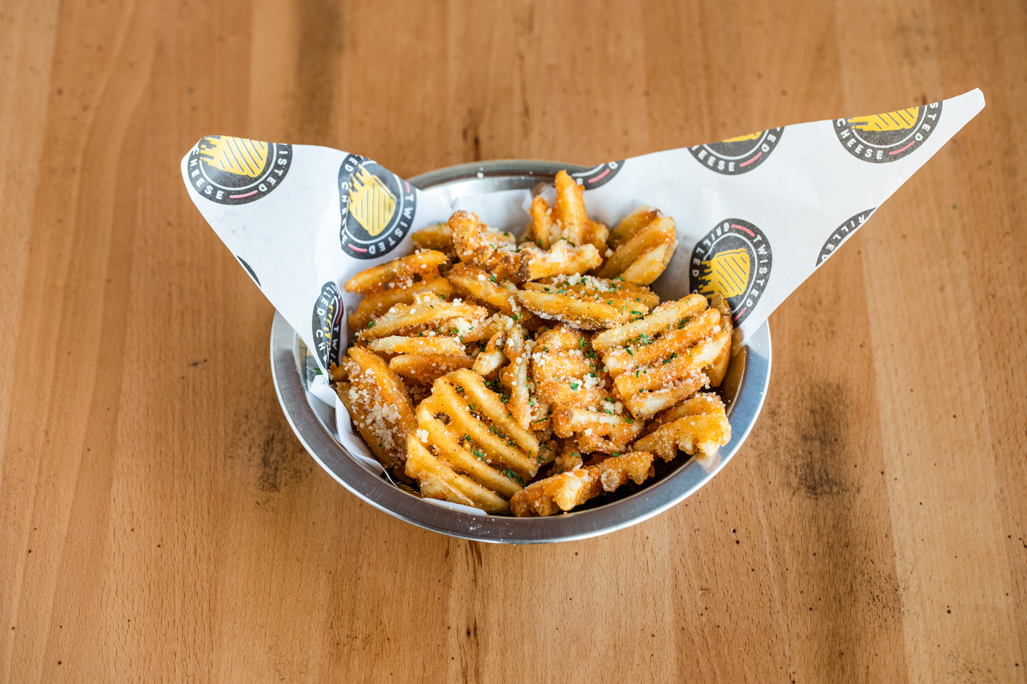 Order Parmesan Waffle Fries food online from Twisted Grilled Cheese store, Houston on bringmethat.com