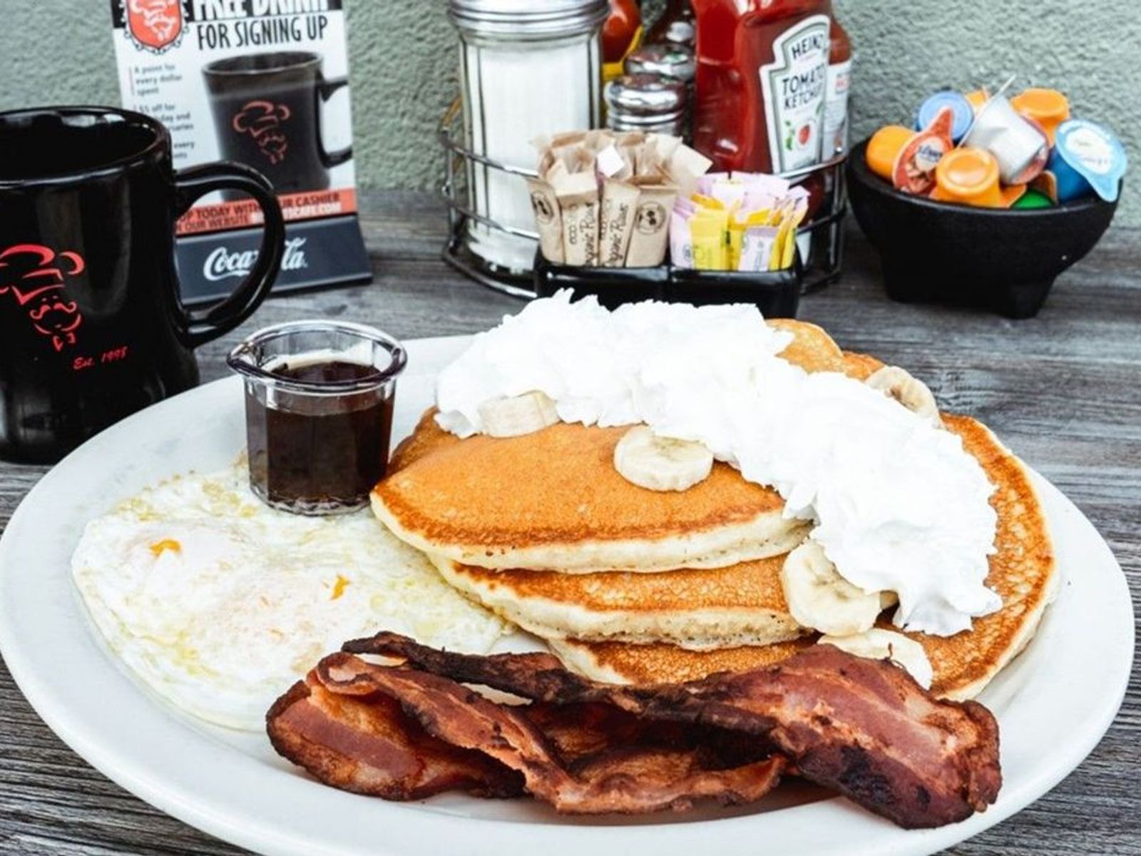 Order Banana Pancakes Combo - OO food online from Biscuits Cafe store, Chandler on bringmethat.com
