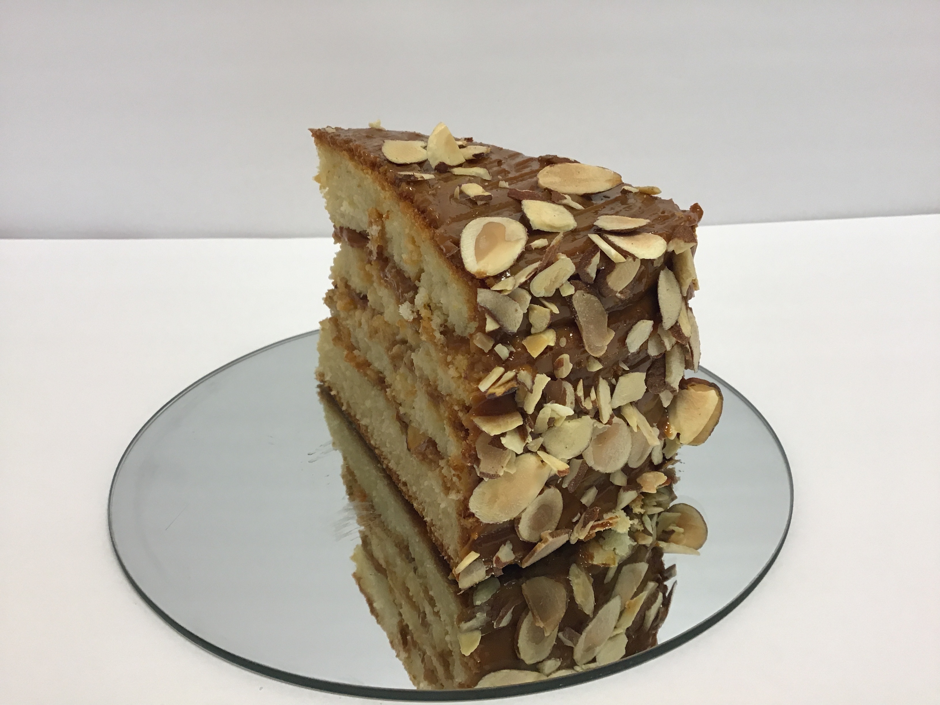 Order Caramel Cake food online from Oma Bakery store, Farmers Branch on bringmethat.com