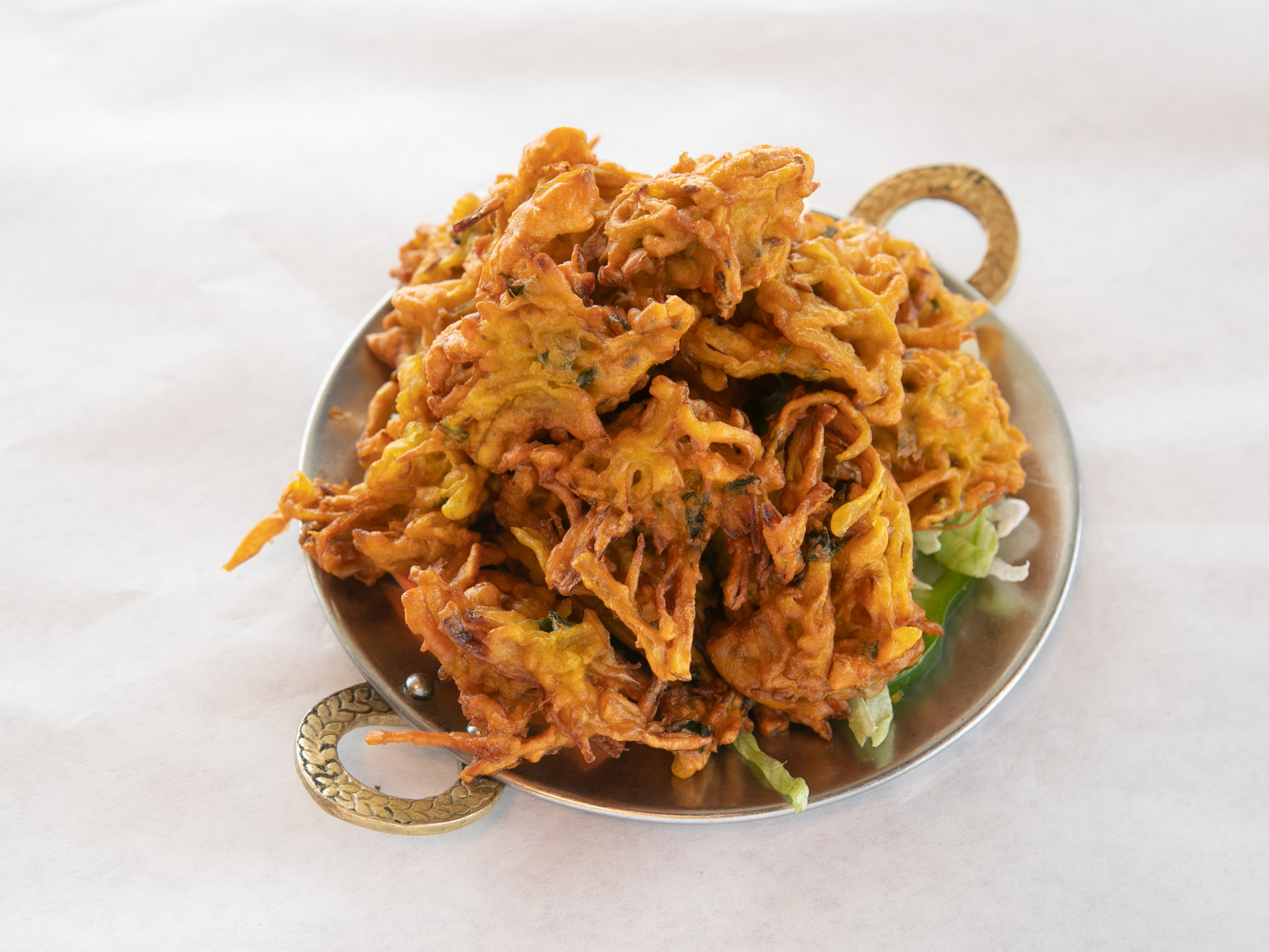 Order 4. Mixed Vegetable Pakora food online from Taste of the Himalayas store, St. Charles on bringmethat.com
