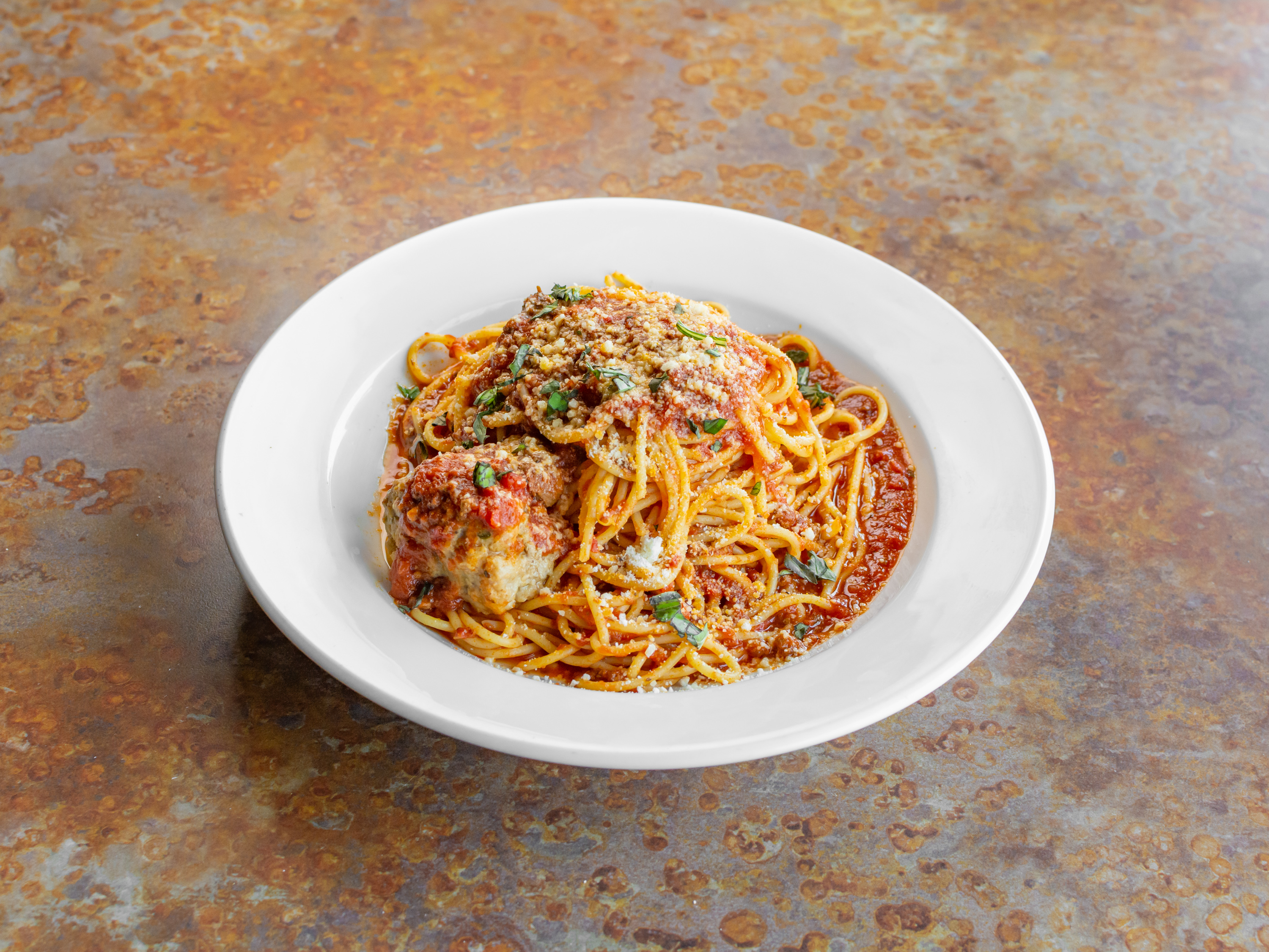 Order Spaghetti food online from Mike's Pizzeria store, Fresno on bringmethat.com