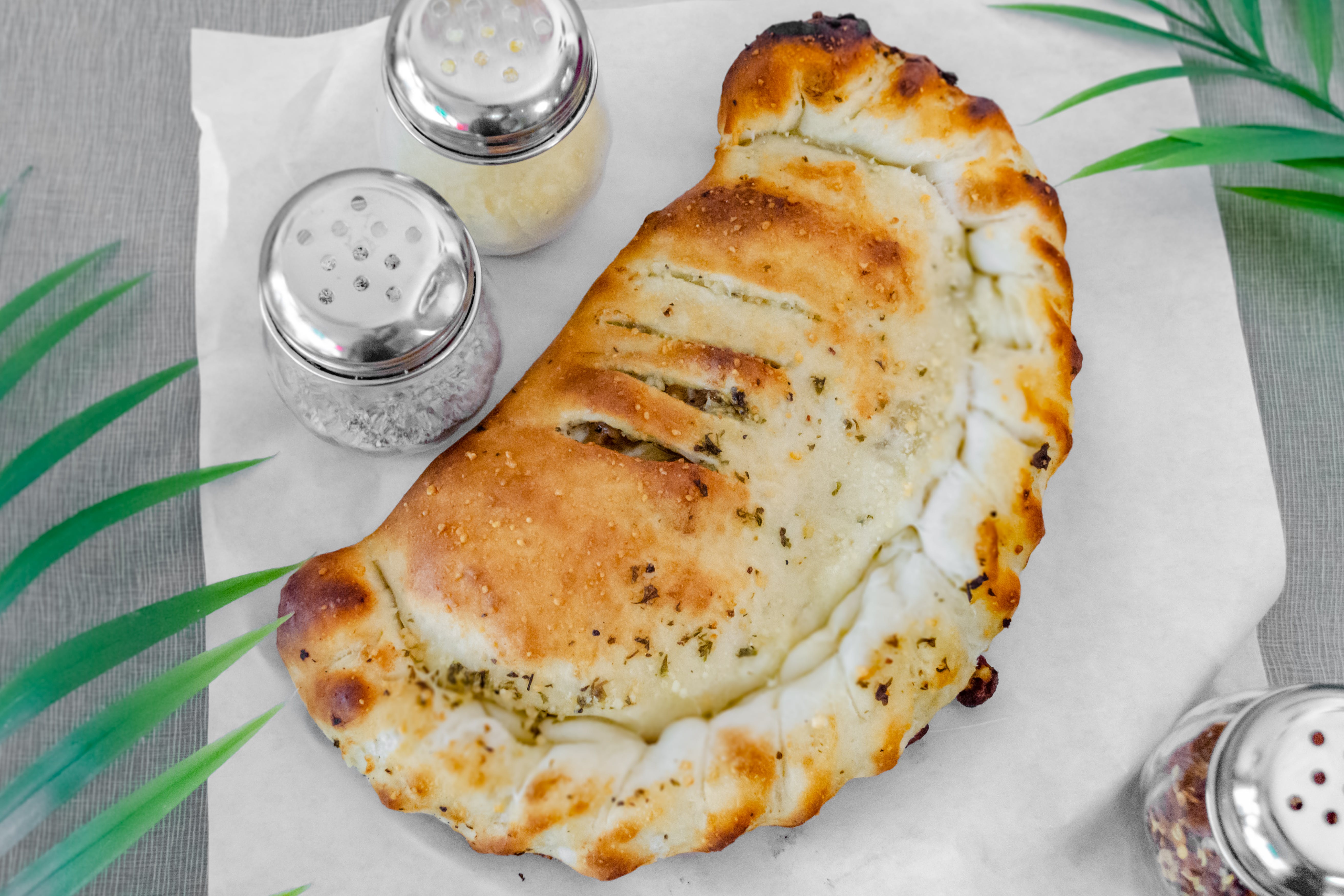 Order Calzone - Serves 2 People food online from Gold Pan Pizzeria store, Shingle Springs on bringmethat.com