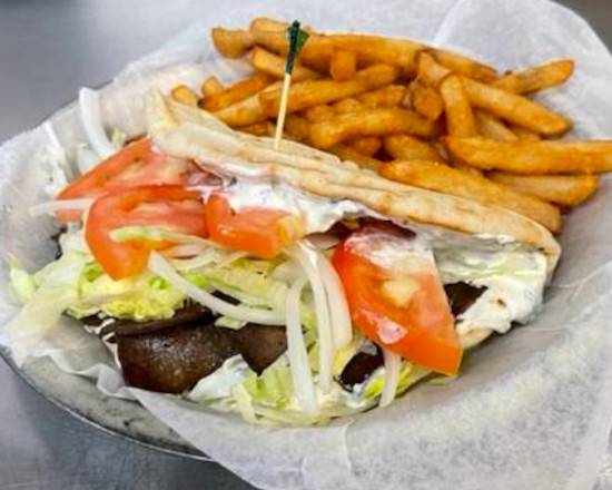 Order The Larry Papadakis Gyro food online from Friends American Grill store, Dawsonville on bringmethat.com