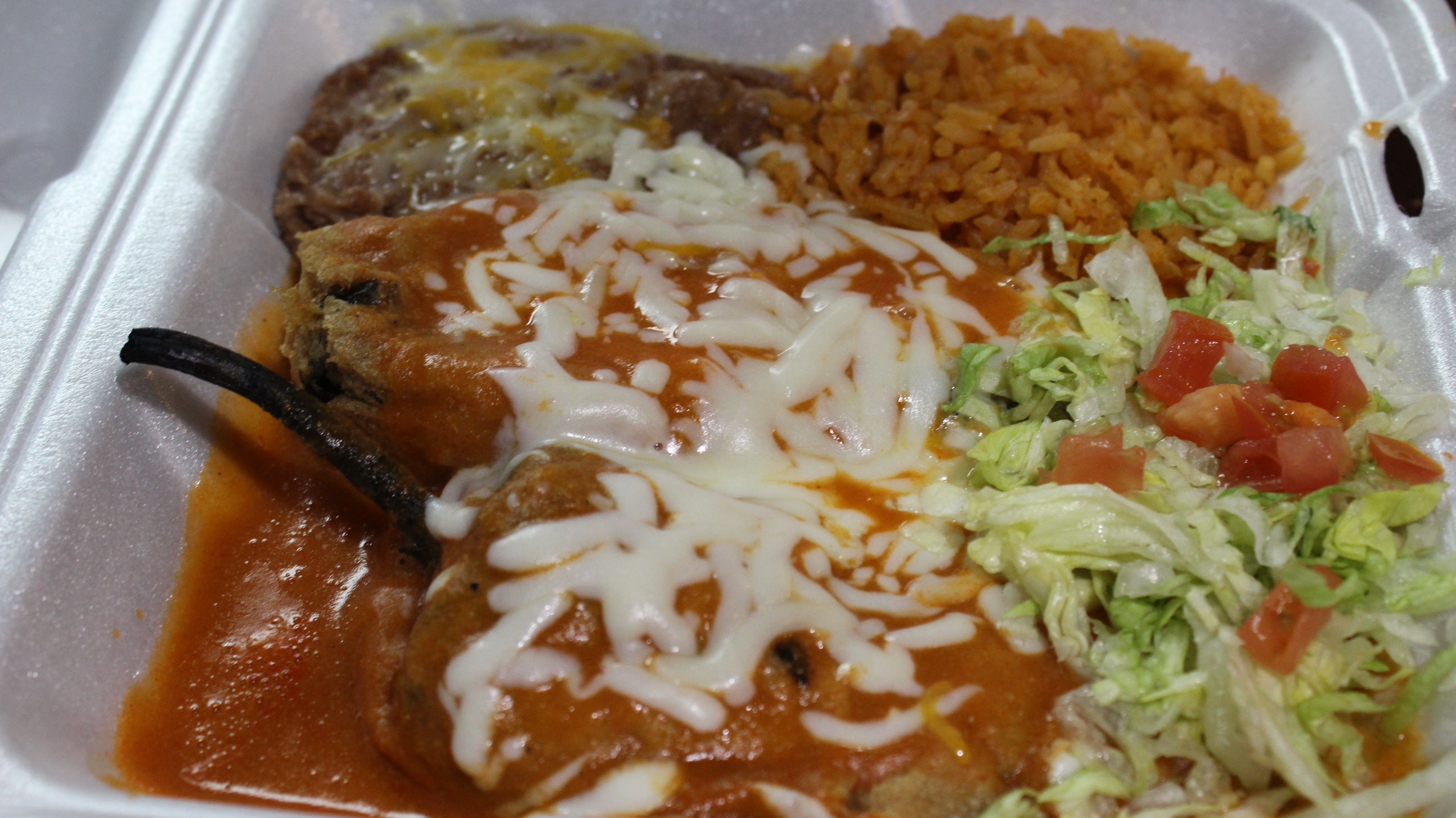 Order #7. Chiles Rellenos Dinner Plate food online from El Tapatio Restaurant store, Muskegon on bringmethat.com