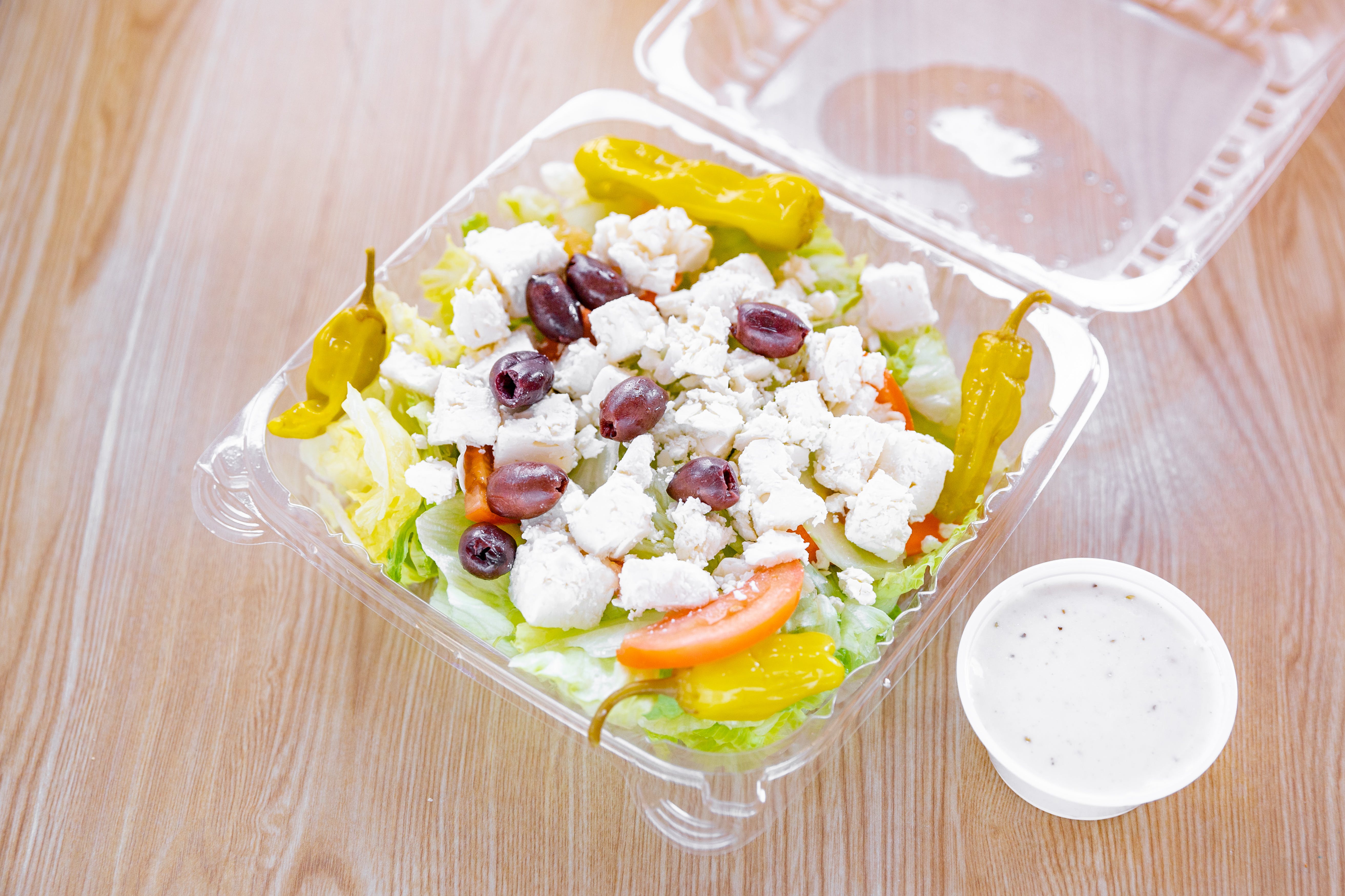 Order Greek Salad - Salad food online from Uxbridge House of Pizza store, Uxbridge on bringmethat.com