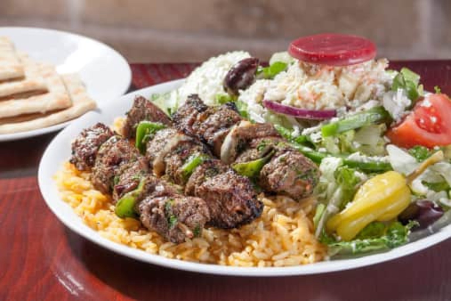 Order Steak Skewers with Rice & Greek Salad Dinner food online from Little Greek Fresh Grill store, Youngstown on bringmethat.com