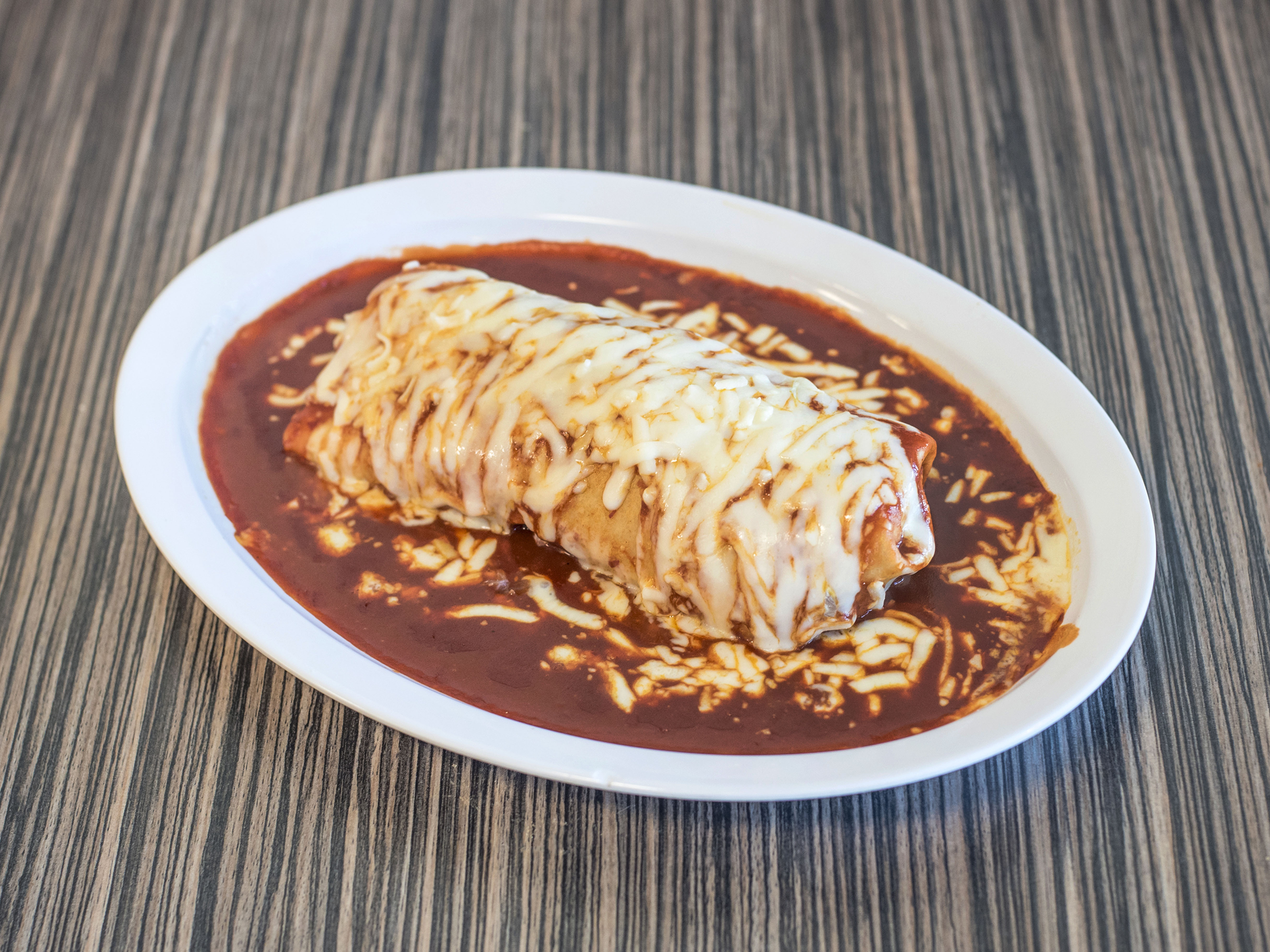 Order Wet Super Burrito food online from Dulce Antojitos store, Pittsburg on bringmethat.com