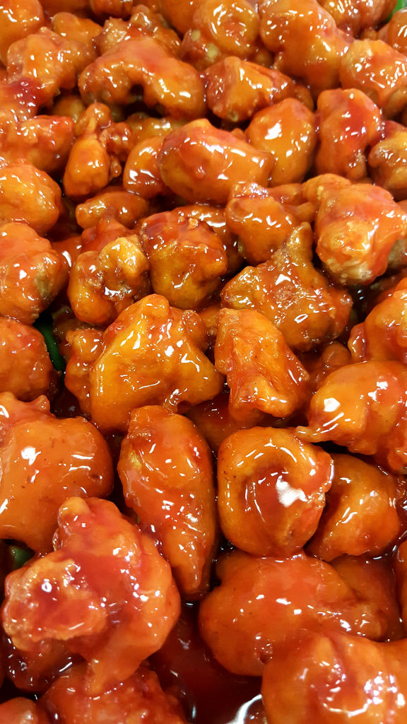 Order Orange Chicken food online from China Wok Express store, St. Louis on bringmethat.com