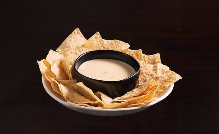 Order White Queso & Chips food online from El Fresco Mexican Grill store, Sully on bringmethat.com