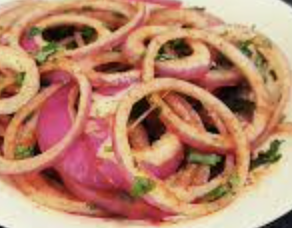 Order Onion Salad food online from Madam Ji store, New York on bringmethat.com