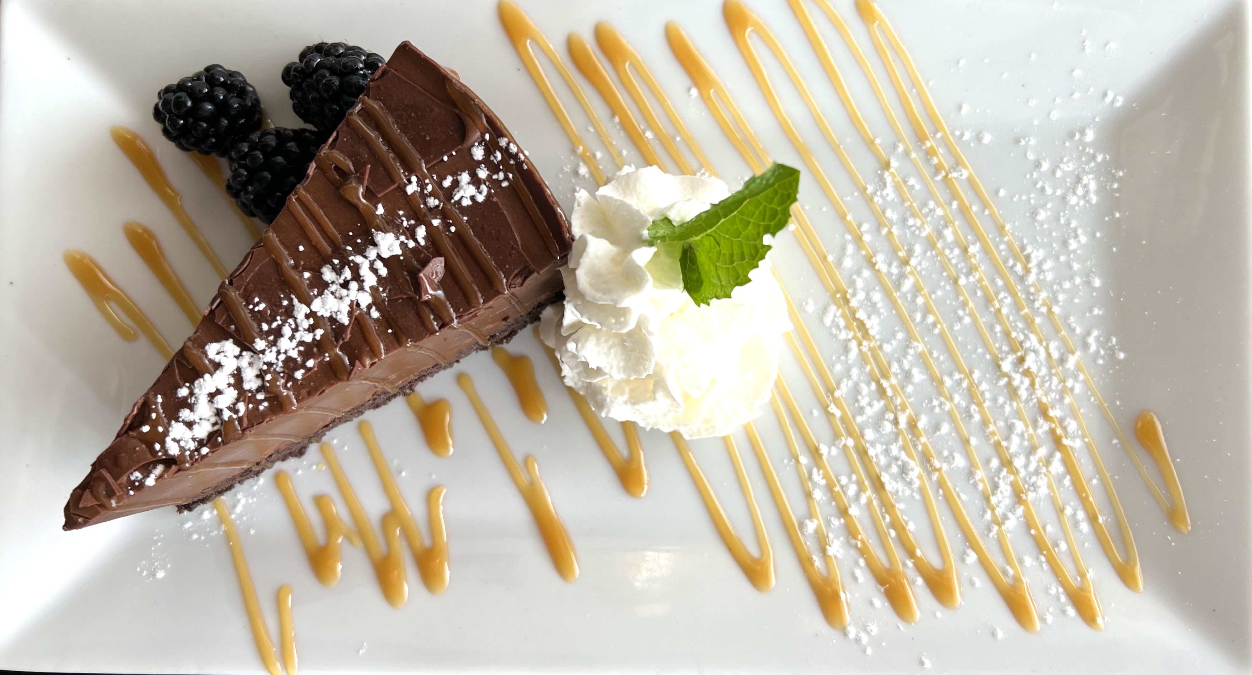 Order Chocolate Mousse Cake - NEW! food online from Mambo Empanadas store, Rutherford on bringmethat.com