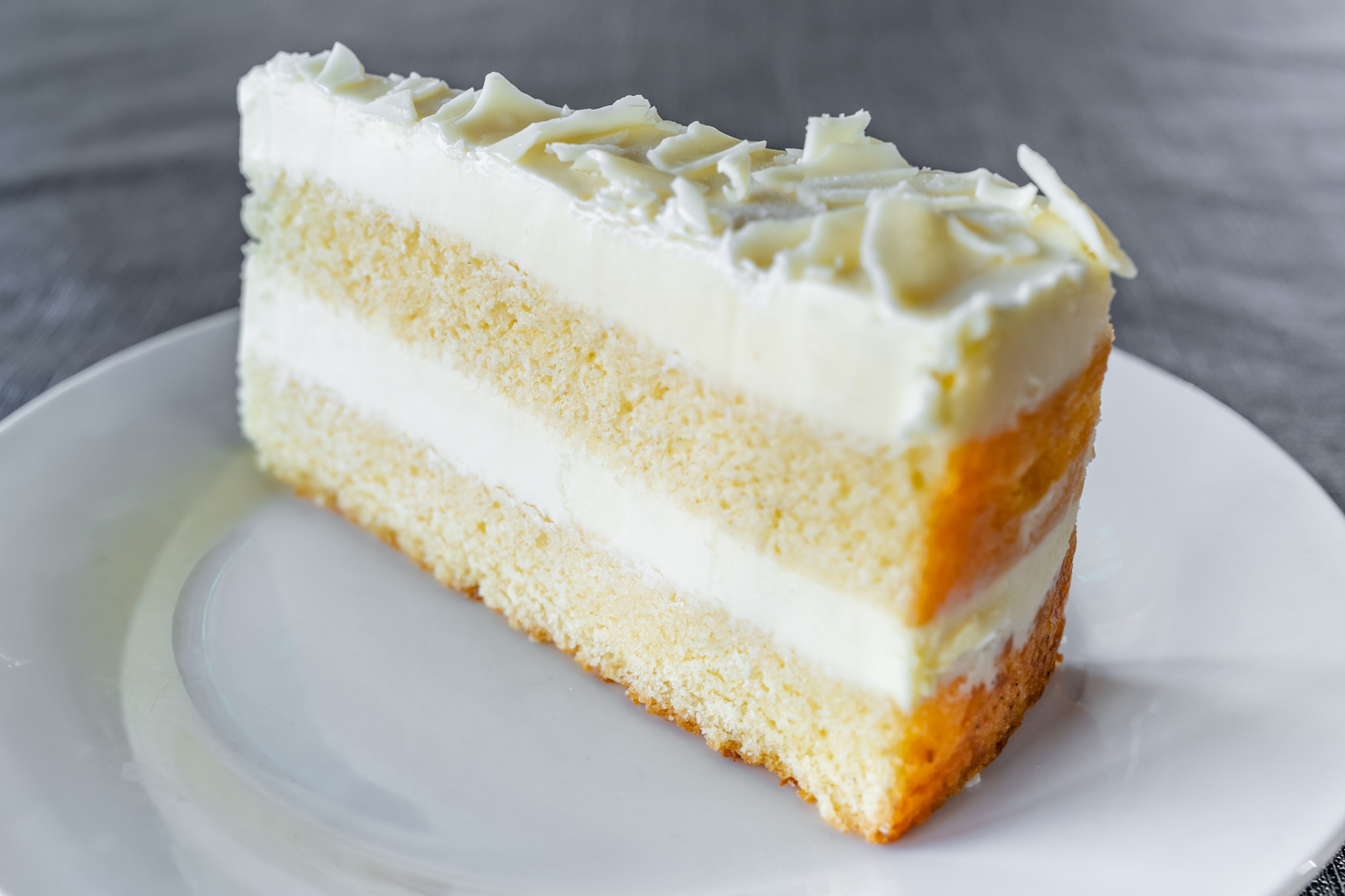 Order Lemon Cake - Dessert food online from Luigi's Italian Restaurant  store, Fort Worth on bringmethat.com
