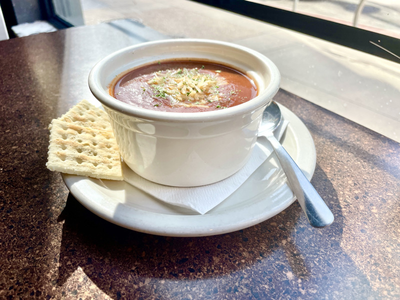 Order Bowl of Tomato Basil Soup food online from Press Box Grill store, Dallas on bringmethat.com