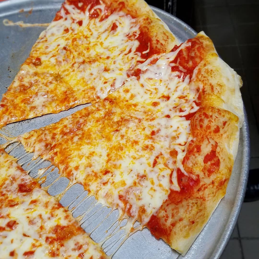 Order Cheese Slice food online from Nino's Pizza store, Boston on bringmethat.com