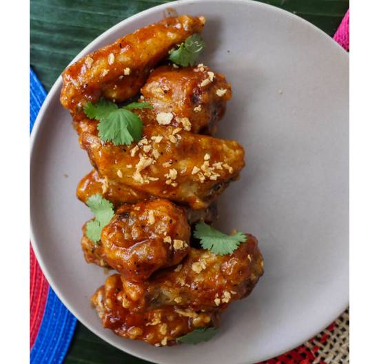 Order TOCINO WINGS food online from Uncle Tito store, San Francisco on bringmethat.com