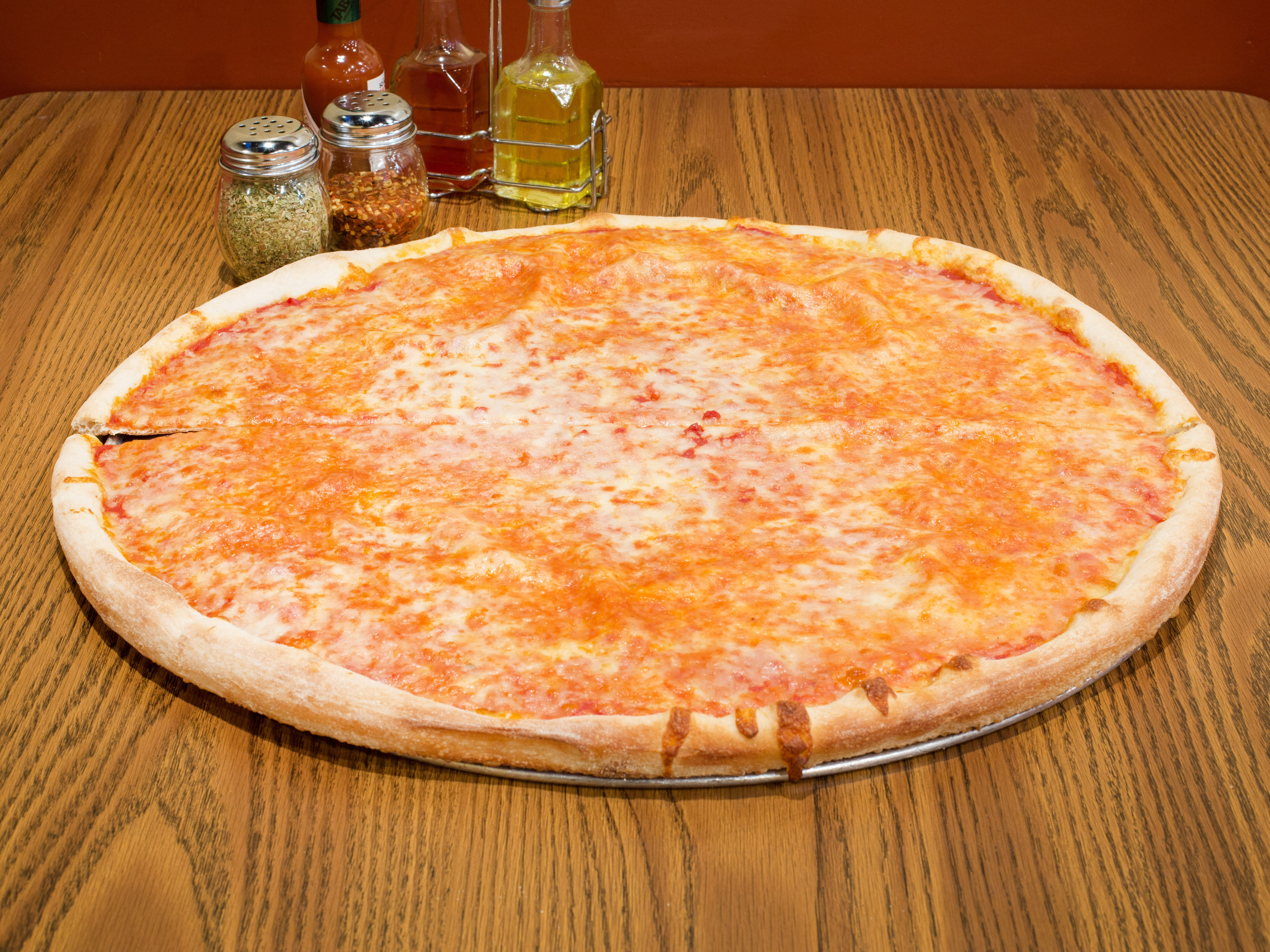 Order Plain Cheese Pizza food online from Puzo Family Restaurant store, North Haledon on bringmethat.com