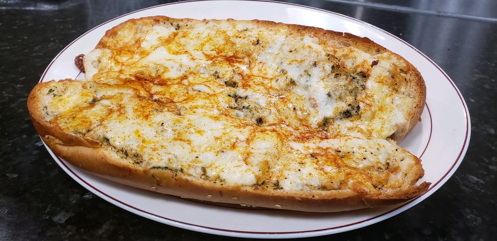 Order Garlic Bread with Mozzarella food online from Mangia Pizza and Italian Restaurant store, North Babylon on bringmethat.com