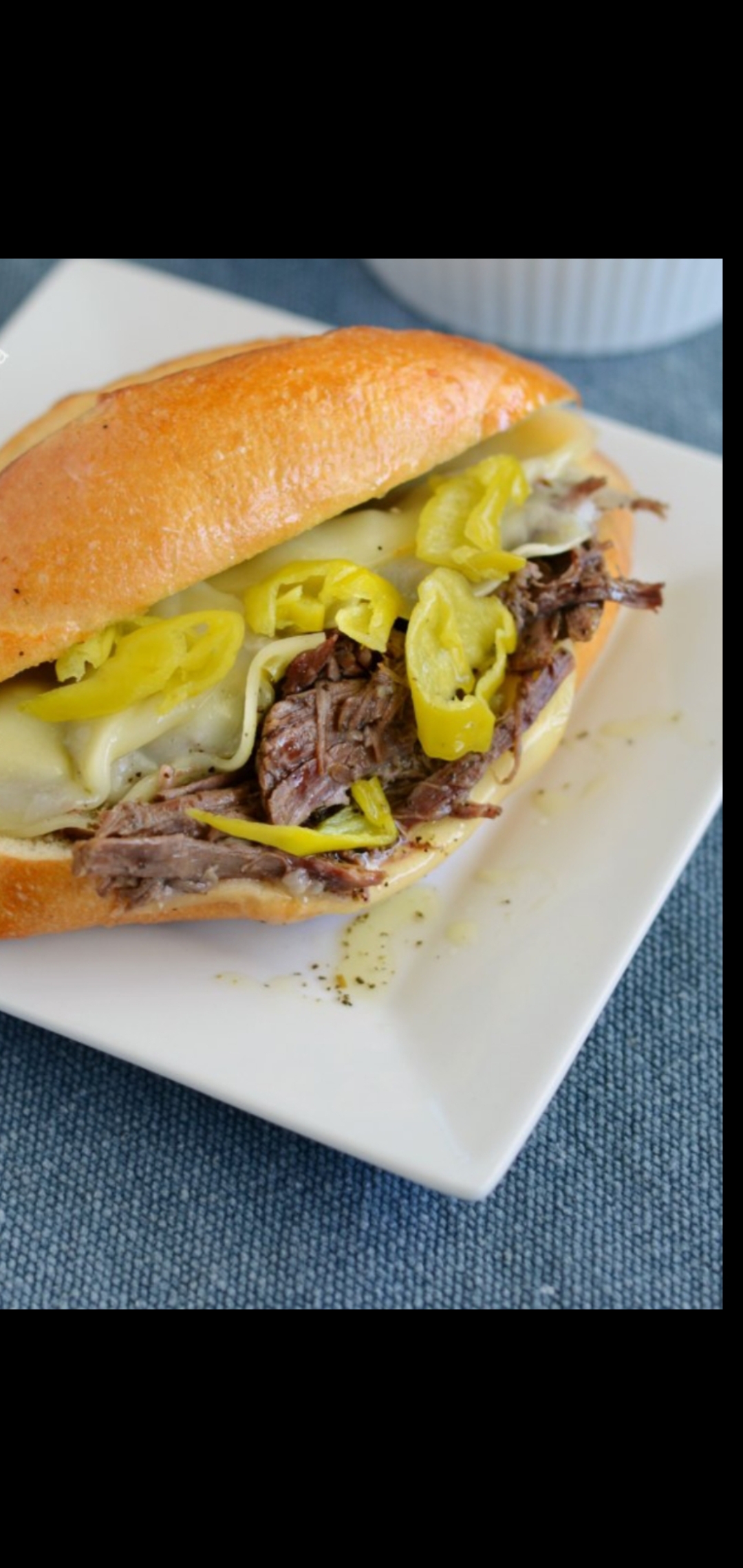 Order Boar's Head Roast Beef Melted Cheese & Banana Peppers Sandwich  food online from American Gourmet Foods Deli store, New York on bringmethat.com