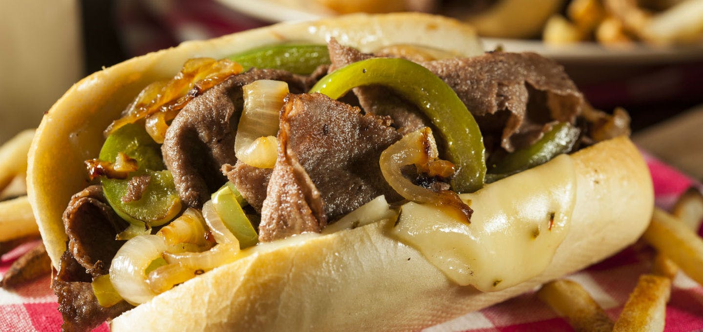 Order Philly Cheesesteak - 1/2 lb. food online from Amy's Family Pizzeria store, Hatboro on bringmethat.com