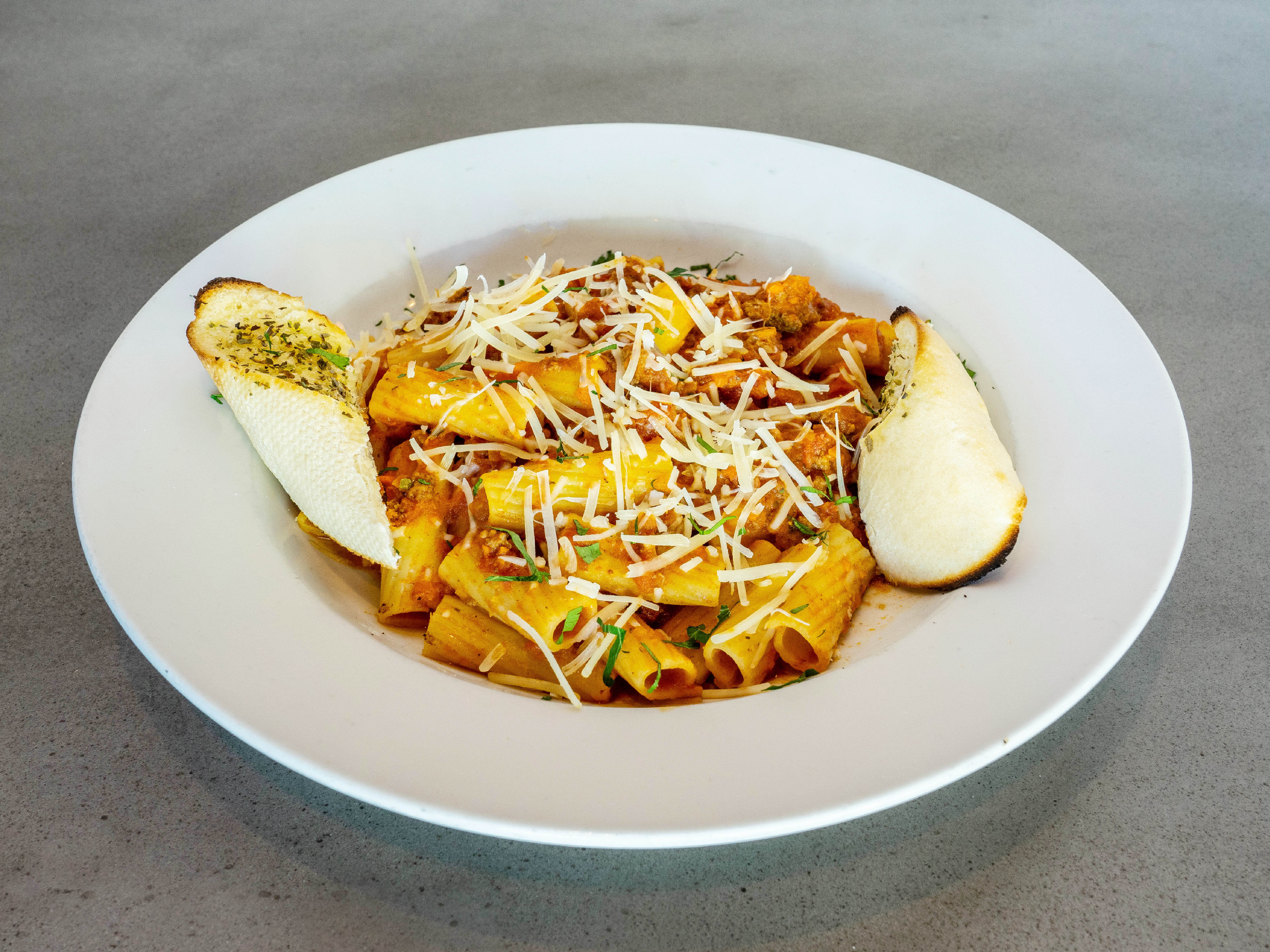 Order Rigatoni Pasta with Homemade Bolognese Sauce food online from The Knolls store, Laguna Niguel on bringmethat.com