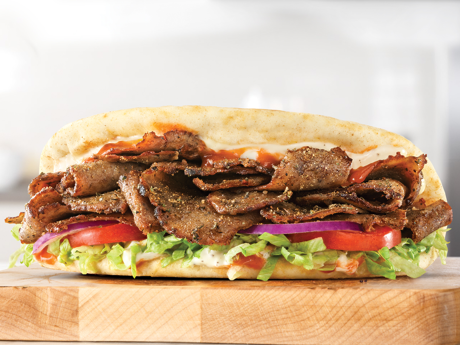 Order Spicy Greek Gyro food online from Arby store, Azle on bringmethat.com