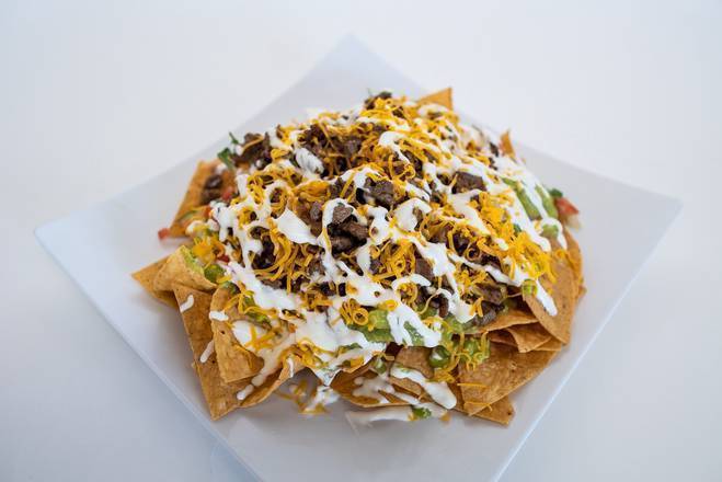 Order Meat Nachos food online from Robertito'S Taco Shop store, Fresno County on bringmethat.com