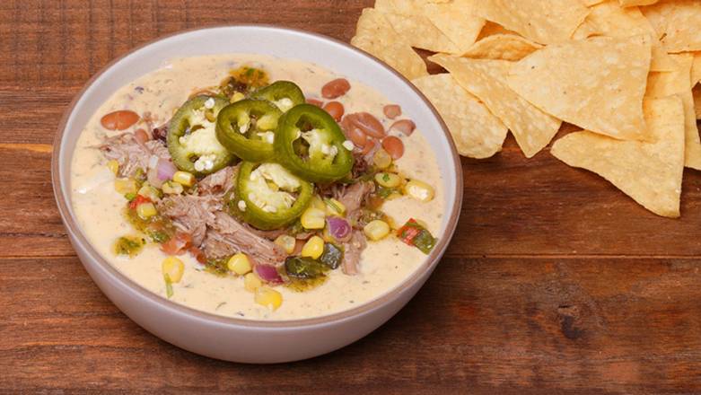 Order Priceless Pork Verde Loaded Queso food online from Pure Gold by Qdoba store, Gambrills on bringmethat.com