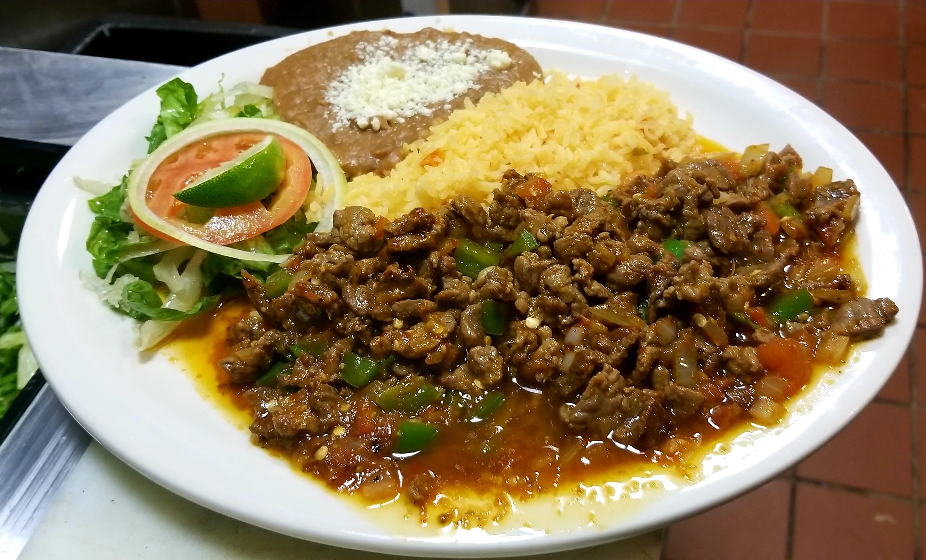 Order Bistec A La Mexicana food online from Mi Antojo Mexican Restaurant store, New Bedford on bringmethat.com