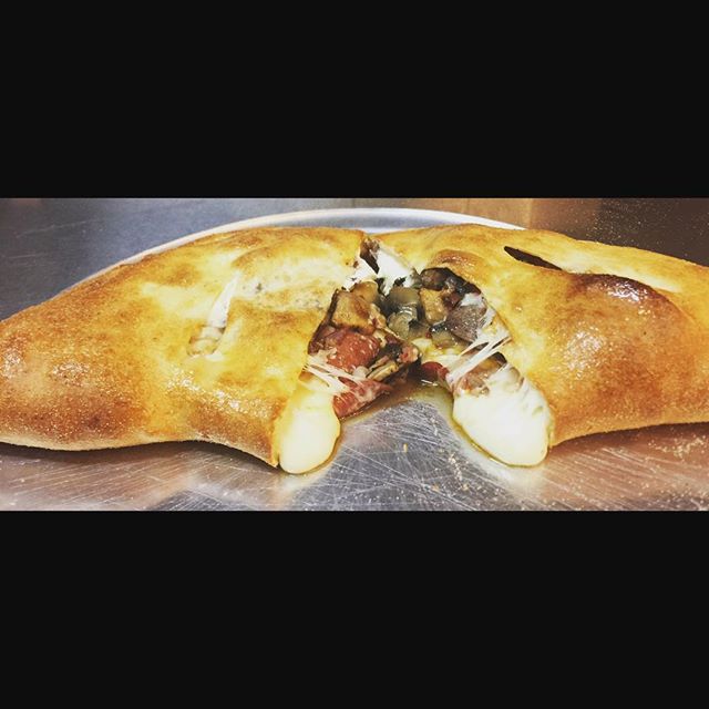 Order Meat Calzone food online from Husky Pizza store, Coventry on bringmethat.com