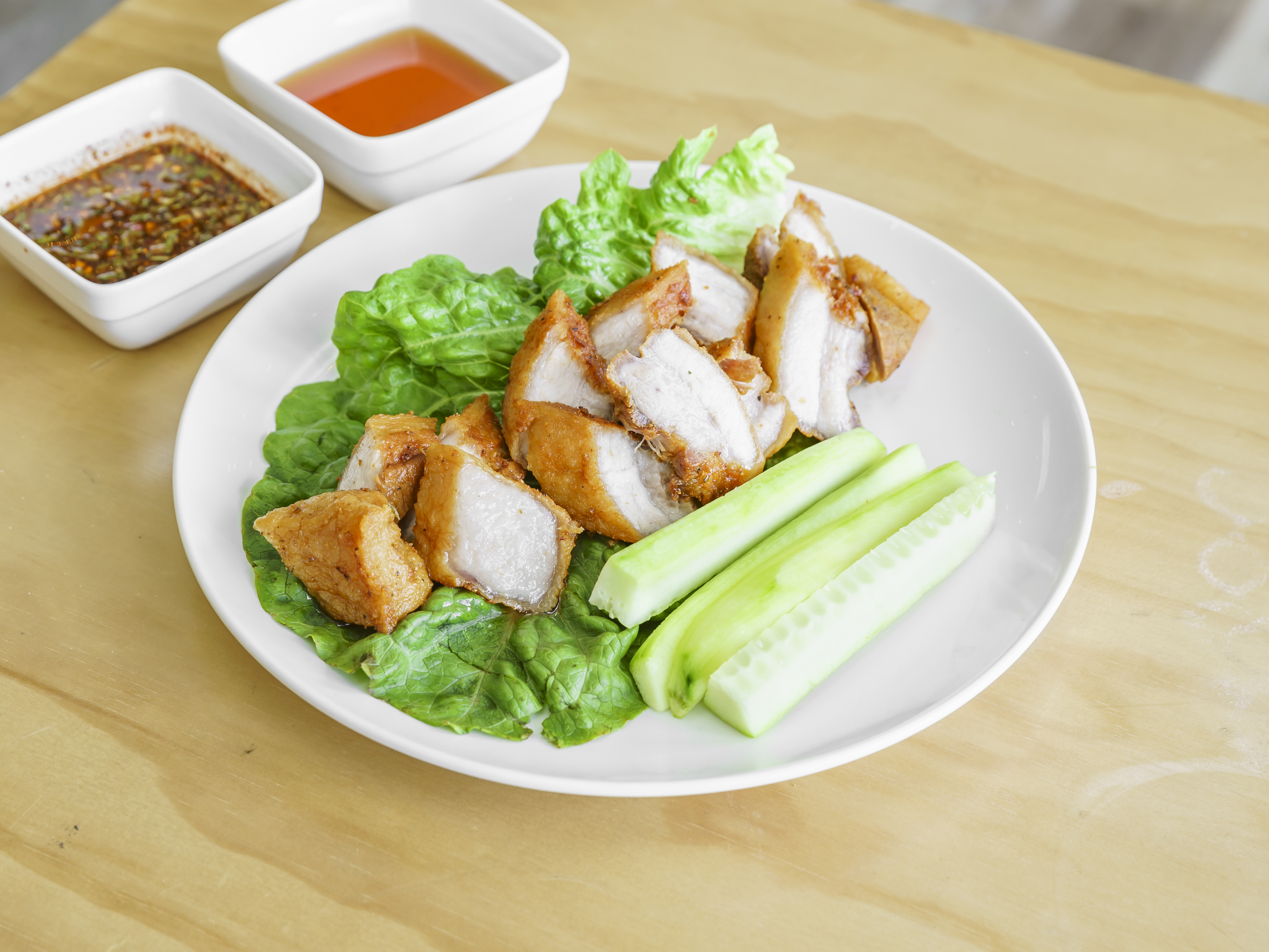 Order Fried Pork Belly food online from Owl Owl Thai Lao Street Food store, Signal Hill on bringmethat.com