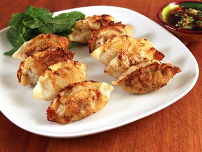 Order Kothey Chicken Momo food online from Swad Indian and Nepalese Cousine store, Fort Worth on bringmethat.com