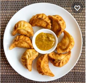 Order 10 Pieces Fried Chicken Momo food online from Royal Kitchen store, Cockeysville on bringmethat.com