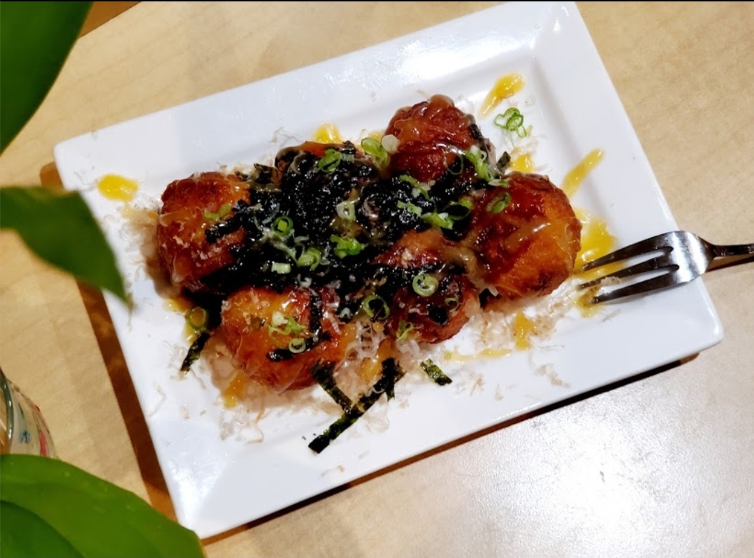 Order 8. Takoyaki food online from Marina Sushi Bar store, San Francisco on bringmethat.com