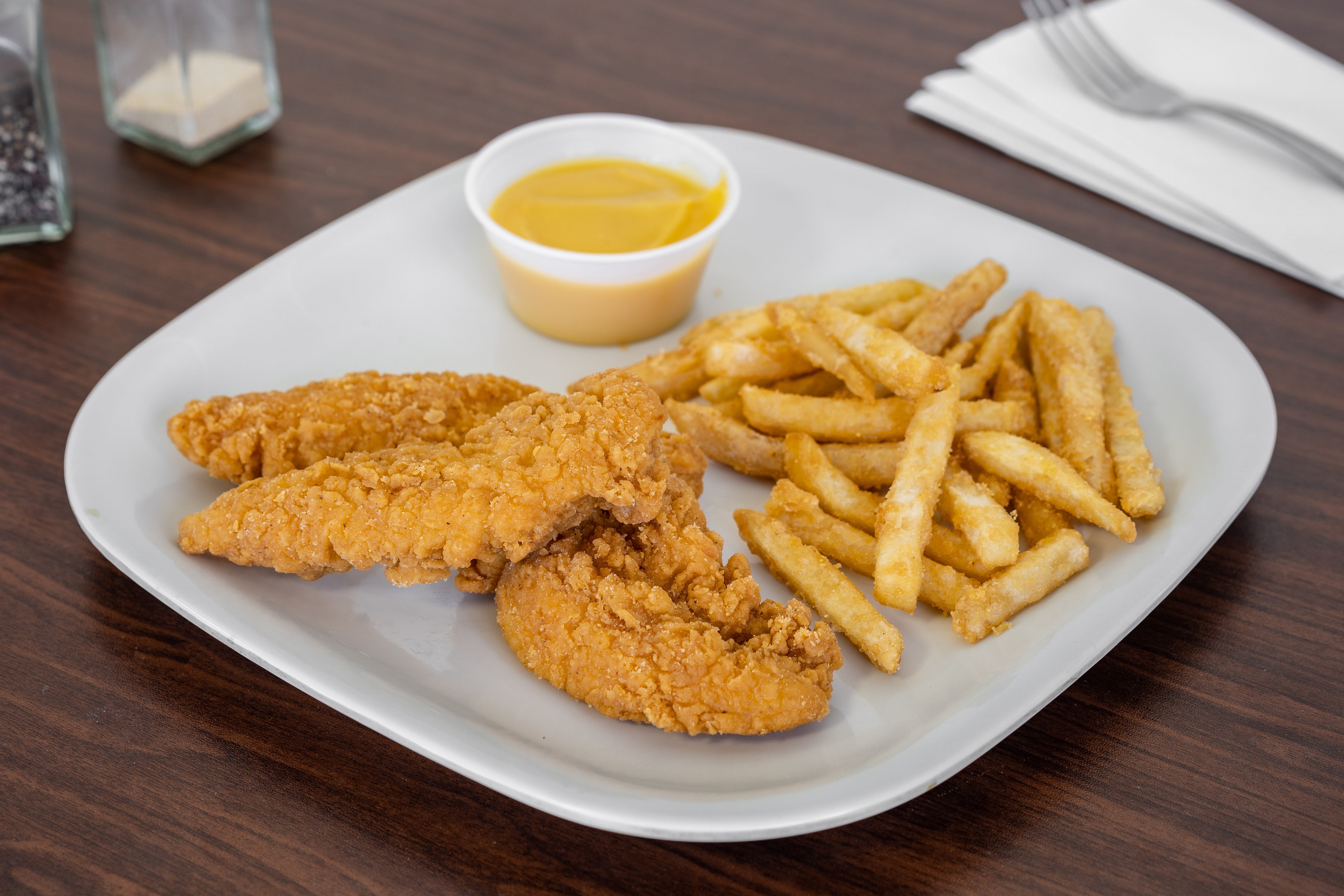 Order Chicken Tenders with Fries - Appetizers food online from Stella Pizzeria store, Perth Amboy on bringmethat.com