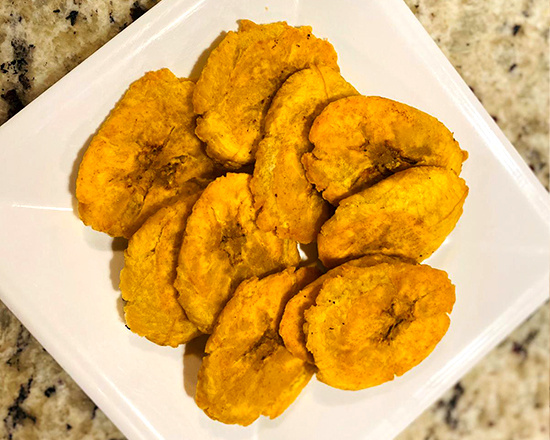 Order Fried Plantains  food online from Versace Dominican Restaurant store, Lilburn on bringmethat.com