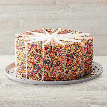 Order Carlo's Bakery Rainbow Cake - Whole Cake food online from Tgi Fridays store, Madison on bringmethat.com