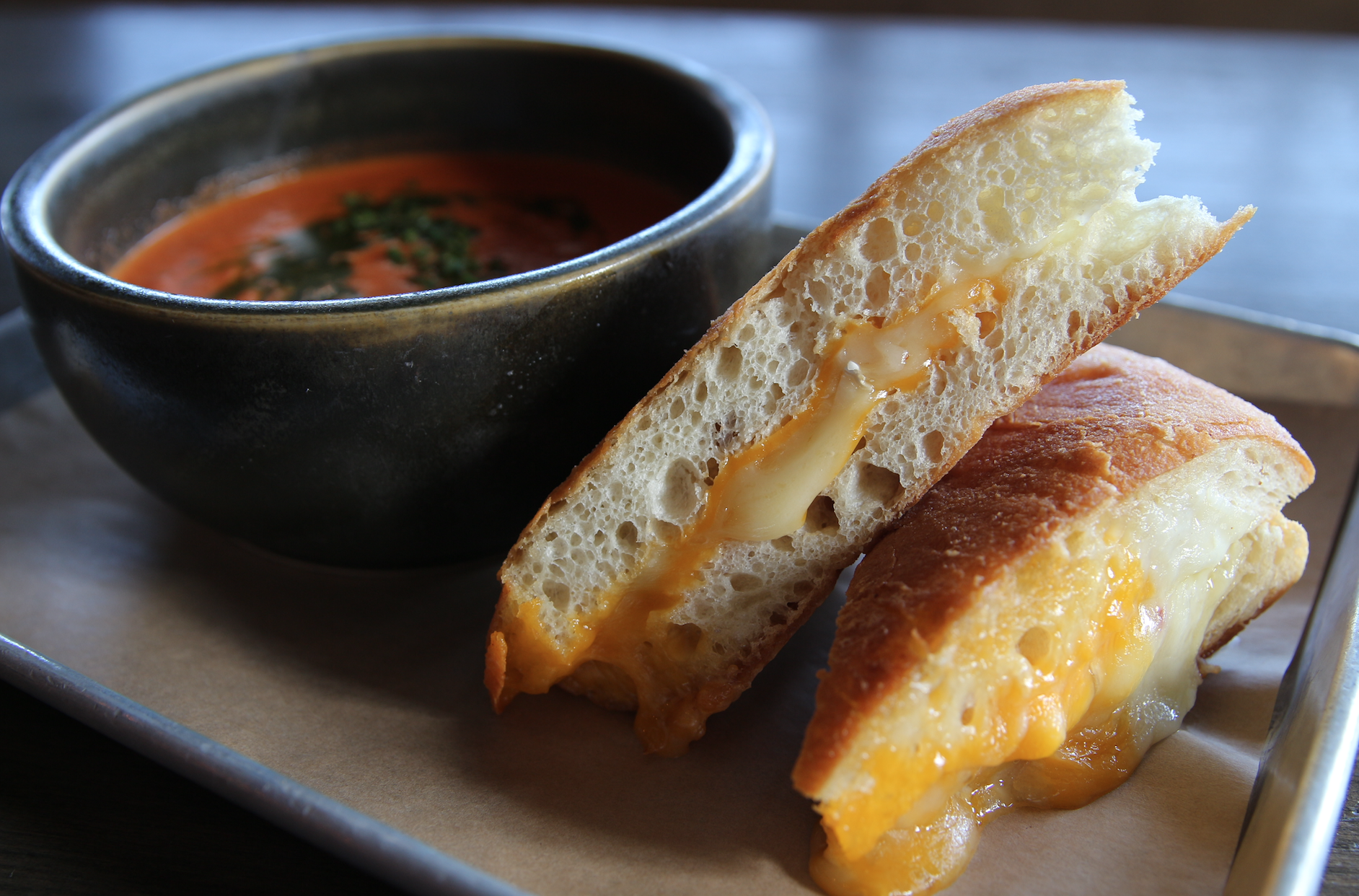 Order Grilled Cheese and Tomato Bisque food online from The Local Peasant store, Woodland Hills on bringmethat.com