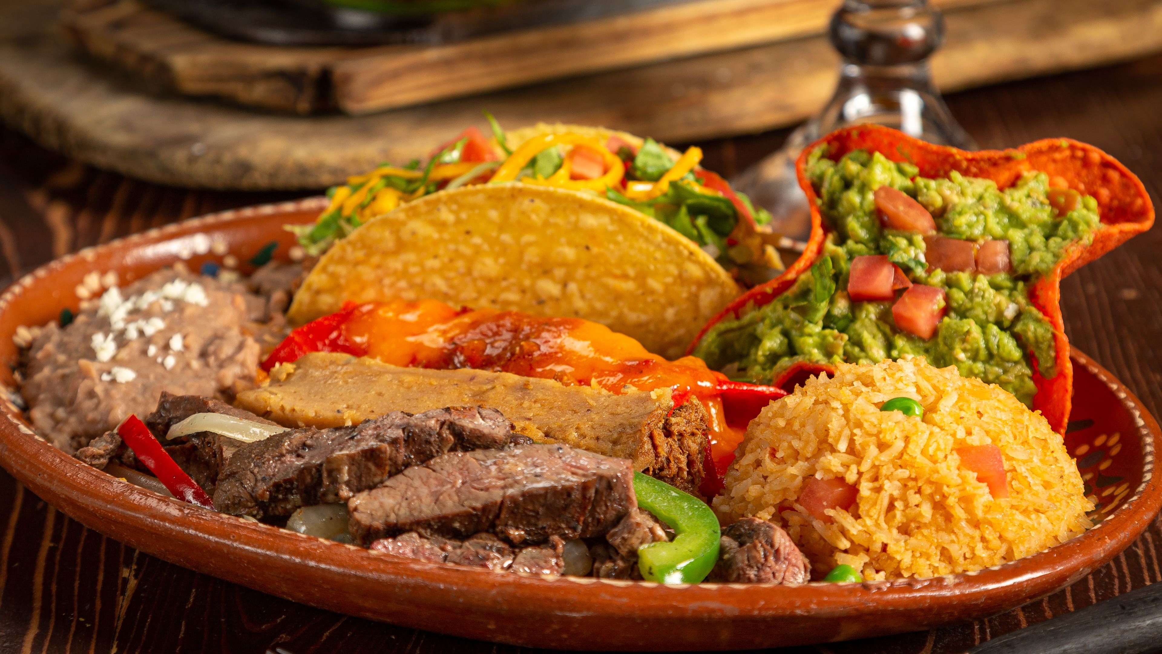 Order Deluxe Mexican Dinner food online from Mi Tierra Cafe & Bakery store, San Antonio on bringmethat.com