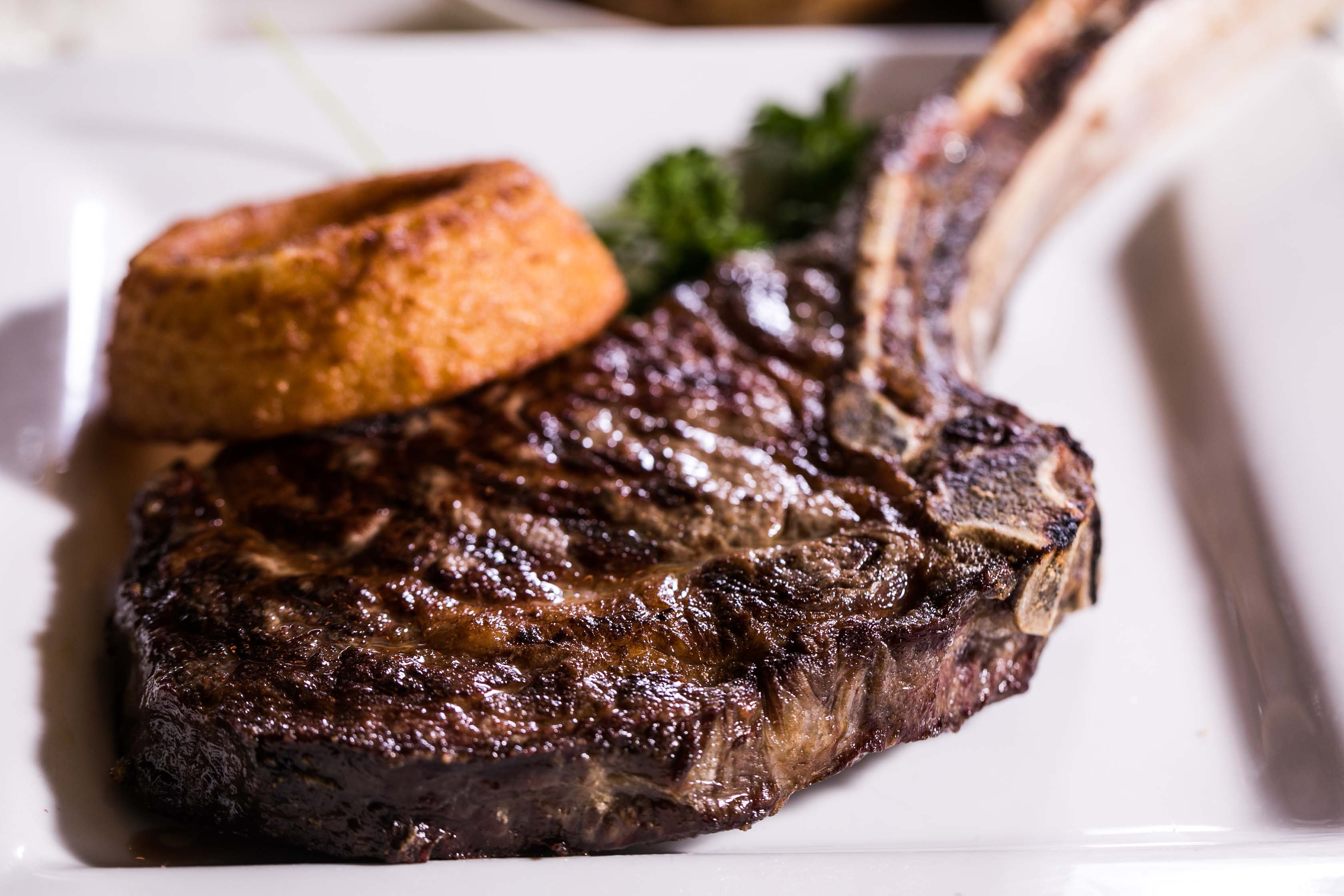 Order Dry-Aged “Tomahawk” Ribeye (24oz) food online from Safehouse Chicago store, Chicago on bringmethat.com