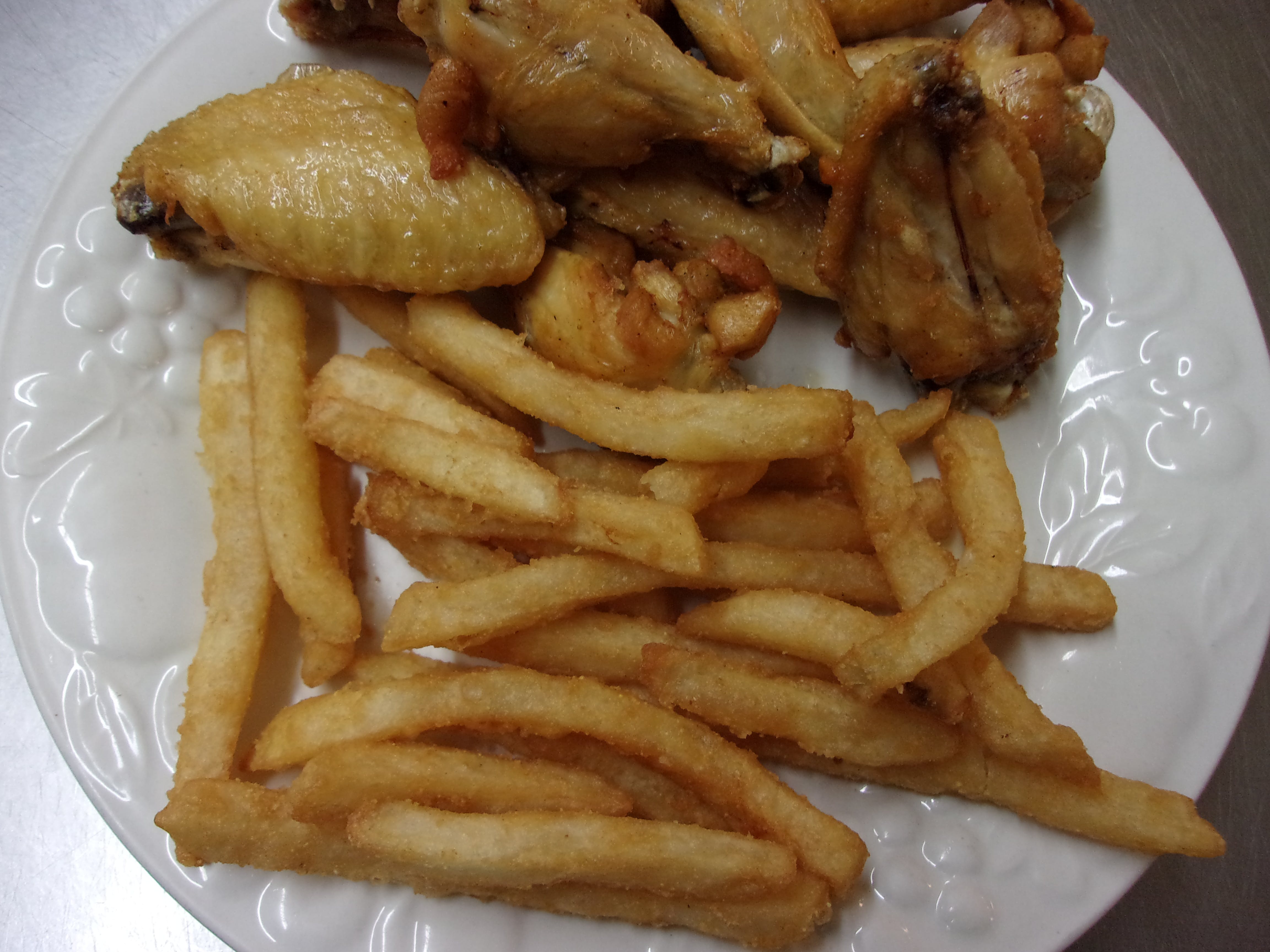 Order Jumbo Wings & Large Fries Combo - 10 Pieces food online from Pizza J store, Mableton on bringmethat.com