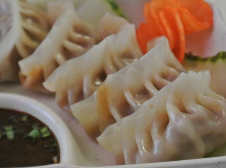 Order A12. Steamed Pork Dumplings food online from Asian Garden store, Martinsburg on bringmethat.com