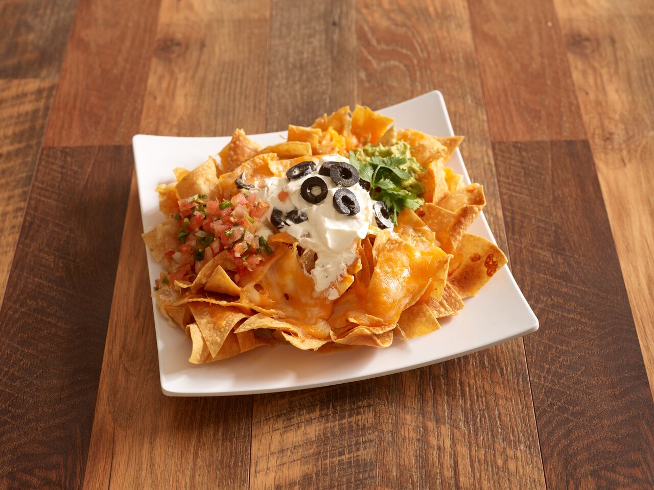 Order Nachos food online from Tony's Mexican Grill store, Sherman Oaks on bringmethat.com