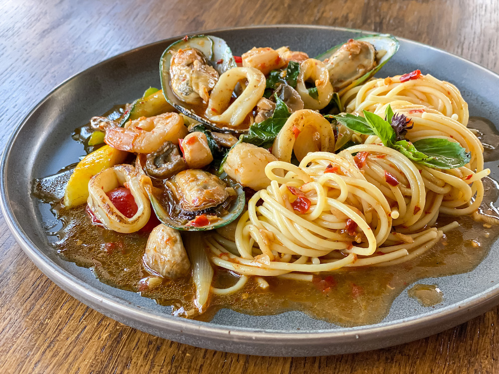 Order Seafood Madness Spaghetti food online from Thai Amarin store, Newton on bringmethat.com