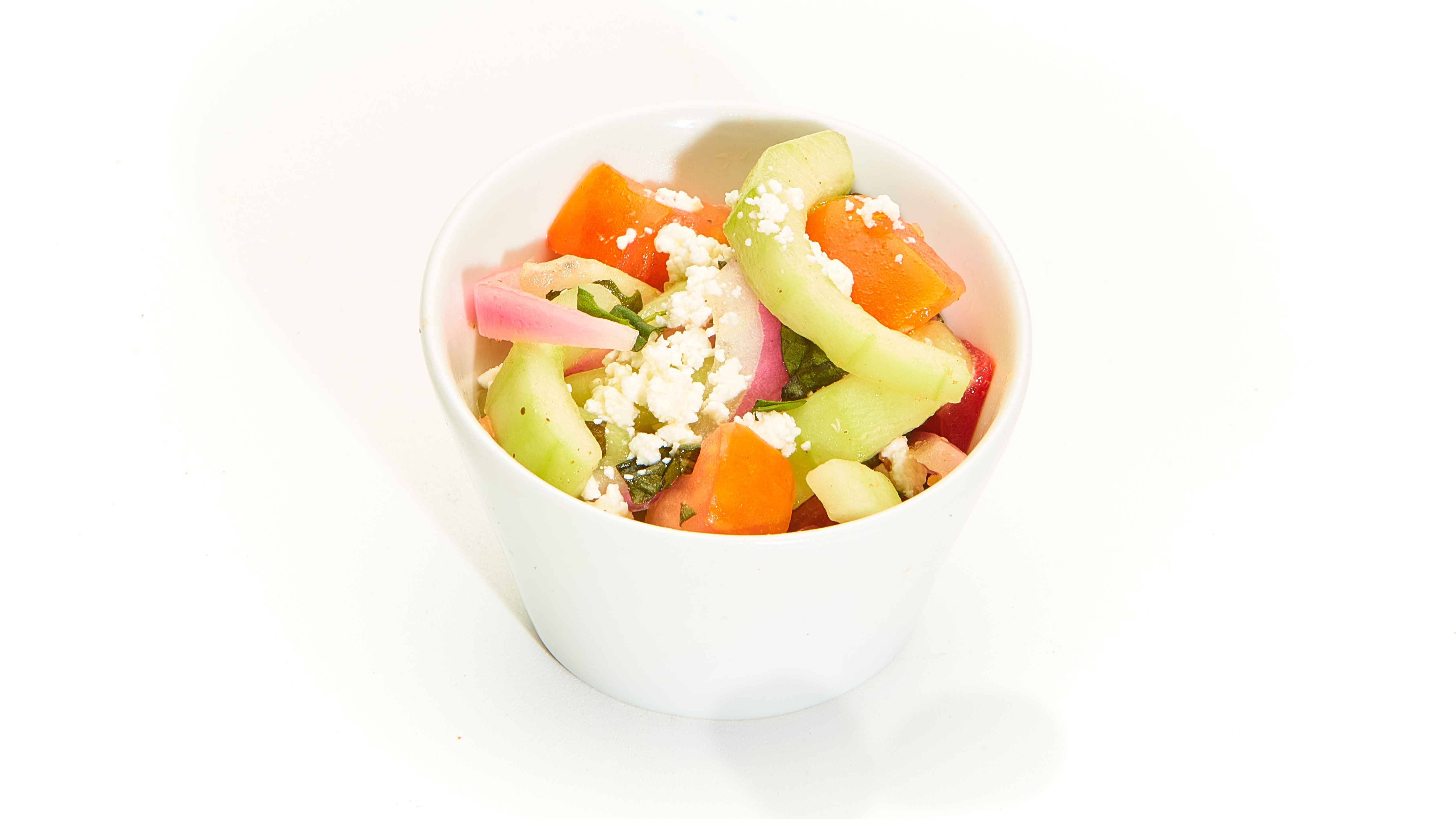 Order Side of Tomato Cucumber Salad food online from Taziki's Mediterranean Cafe store, Charlotte on bringmethat.com