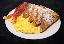 Order French Toast with 2 Eggs Any Style and Choice of Meat food online from Kellogg's diner store, Brooklyn on bringmethat.com