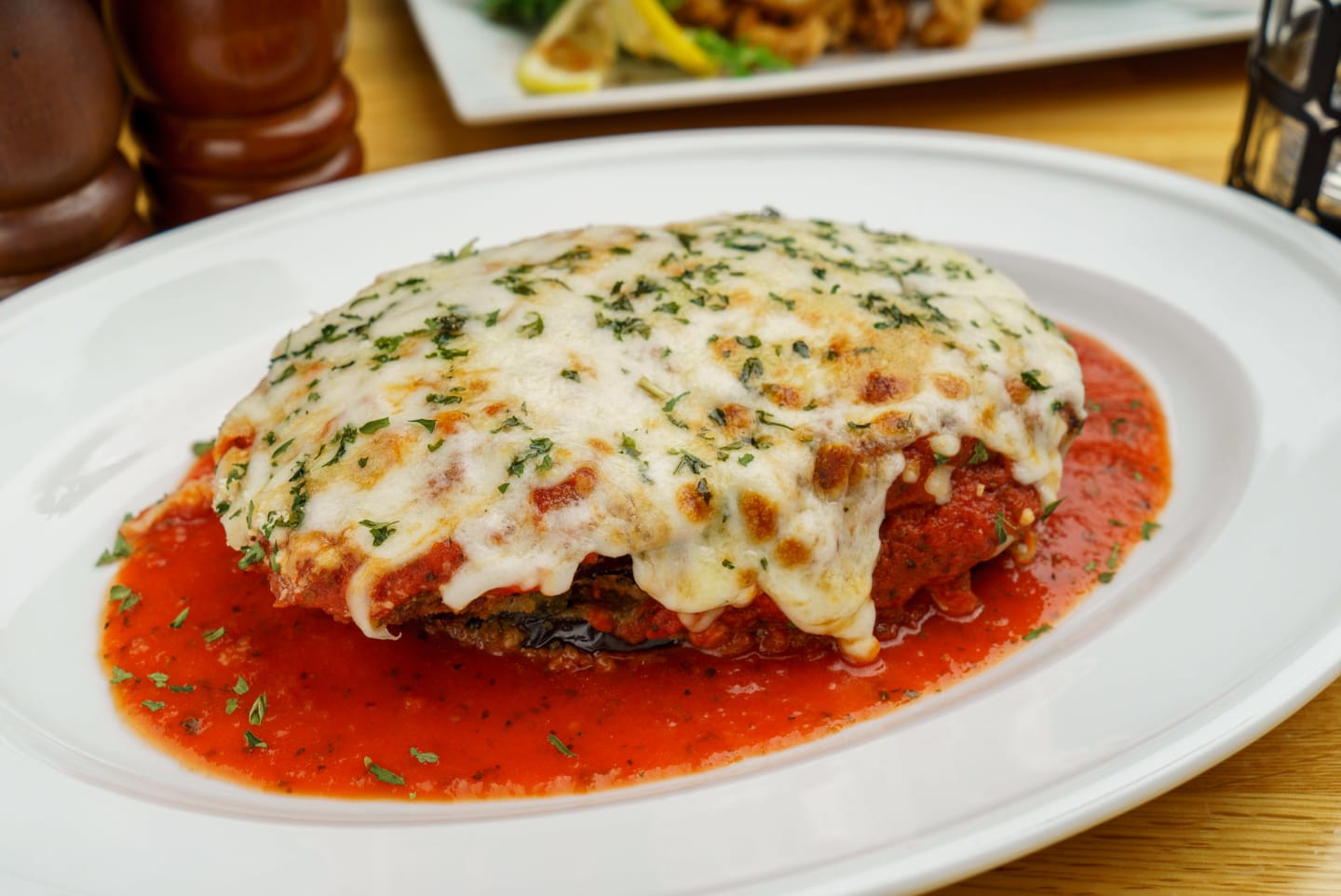Order Eggplant Parmigiana food online from Caffe Amici store, Columbus on bringmethat.com